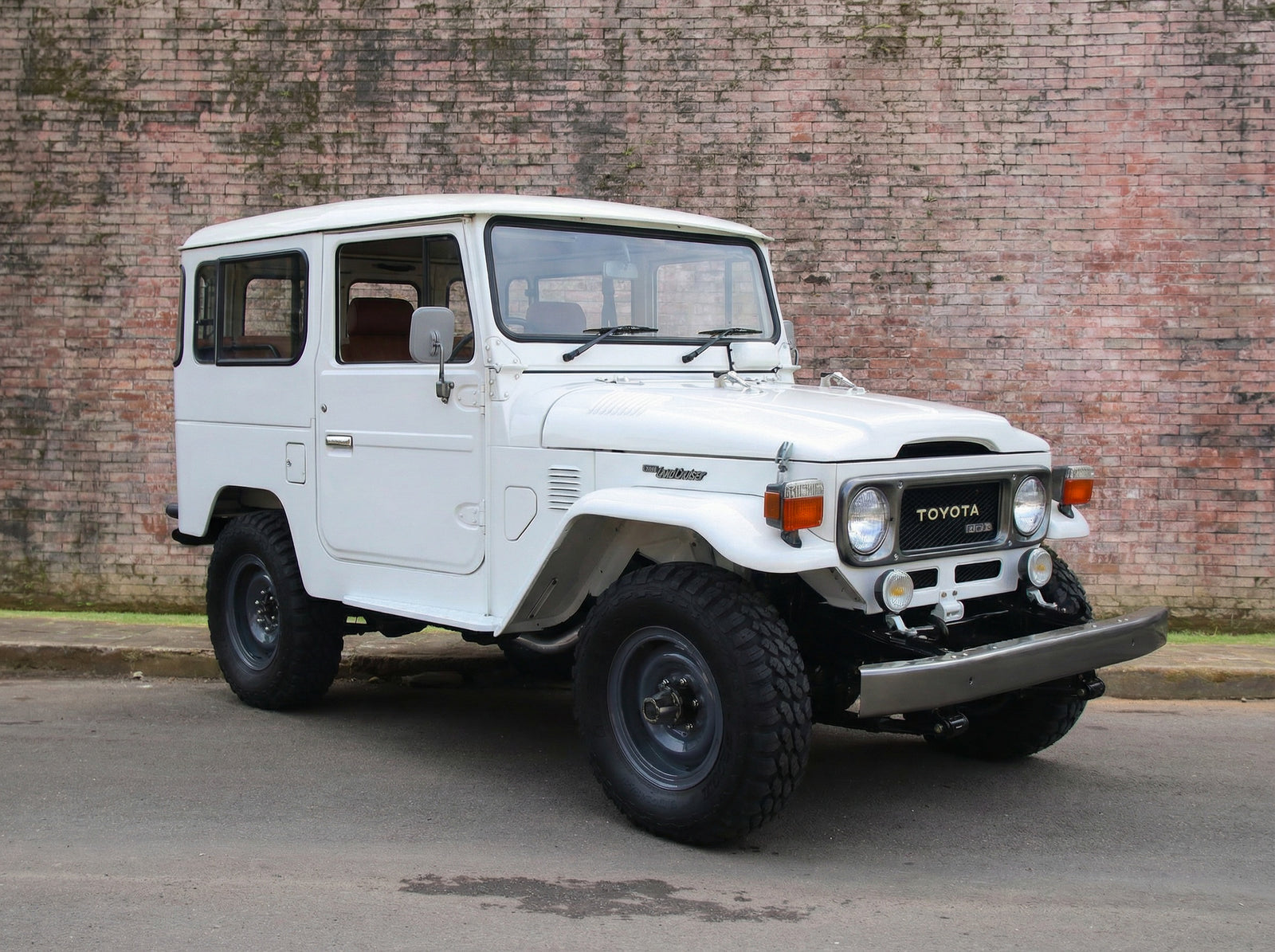 Classic Toyota 40 Series 1983 White Toyota BJ40 Land Cruiser Diesel with Custom Brown Leather Interior. Newly Restored by Hogg & Swan