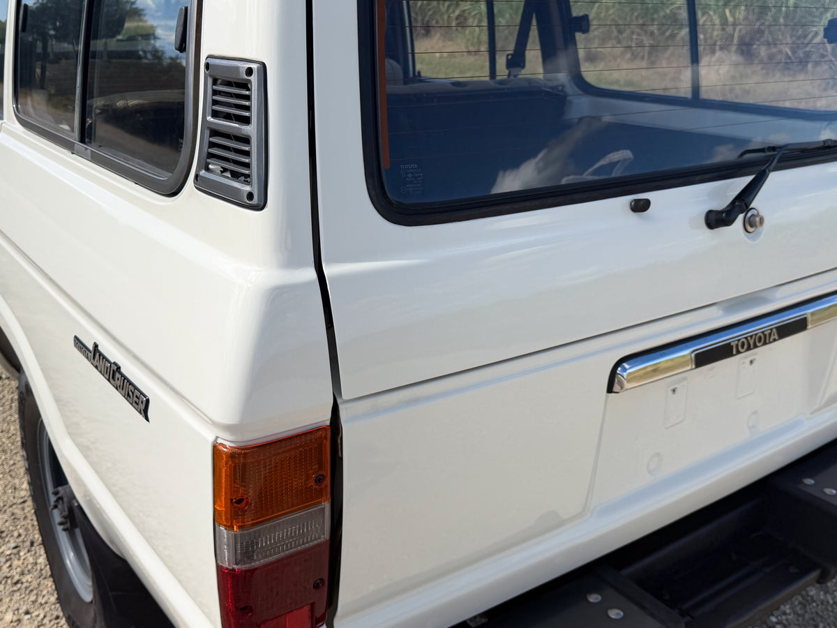 White 60 Series 1986 Toyota HJ61 Turbo Diesel Land Cruiser with Many Genuine Toyota Parts For Sale