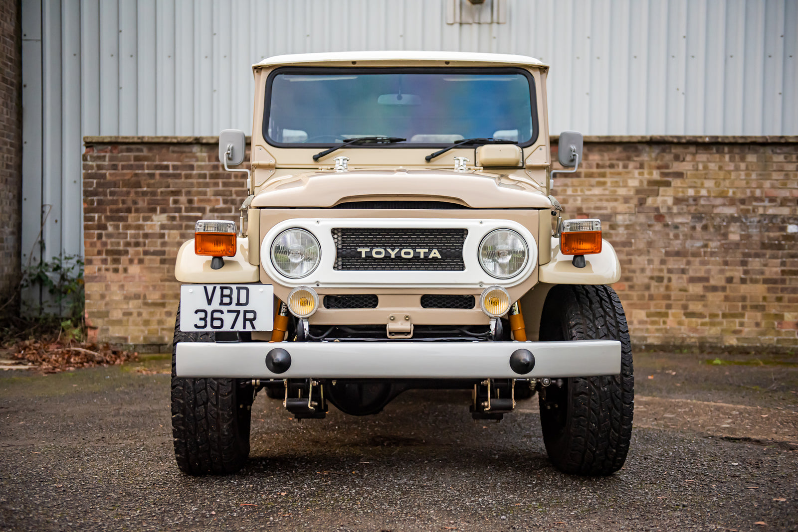 Restored 1977 Toyota FJ40 Land Cruiser in Beige with Classic Tyres and Upgraded Suspension