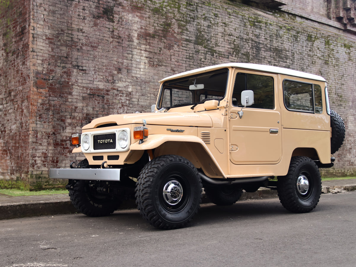1981 Beige Toyota FJ40 Land Cruiser with 15" Steel Rims GT Radial M/T Tyres and Bulk New Genuine Toyota Parts