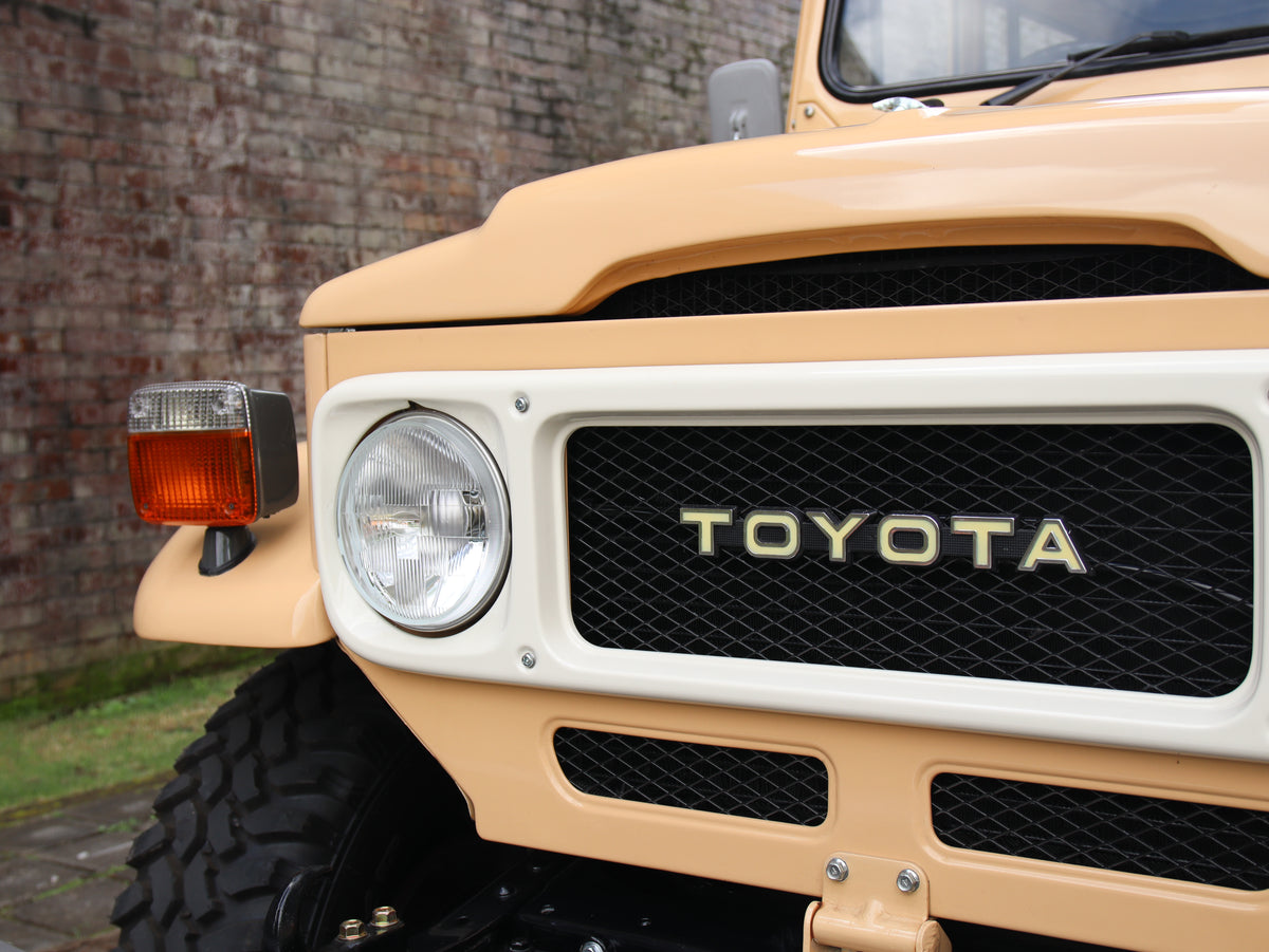 1981 Beige Toyota FJ40 Land Cruiser with 15" Steel Rims GT Radial M/T Tyres and Bulk New Genuine Toyota Parts