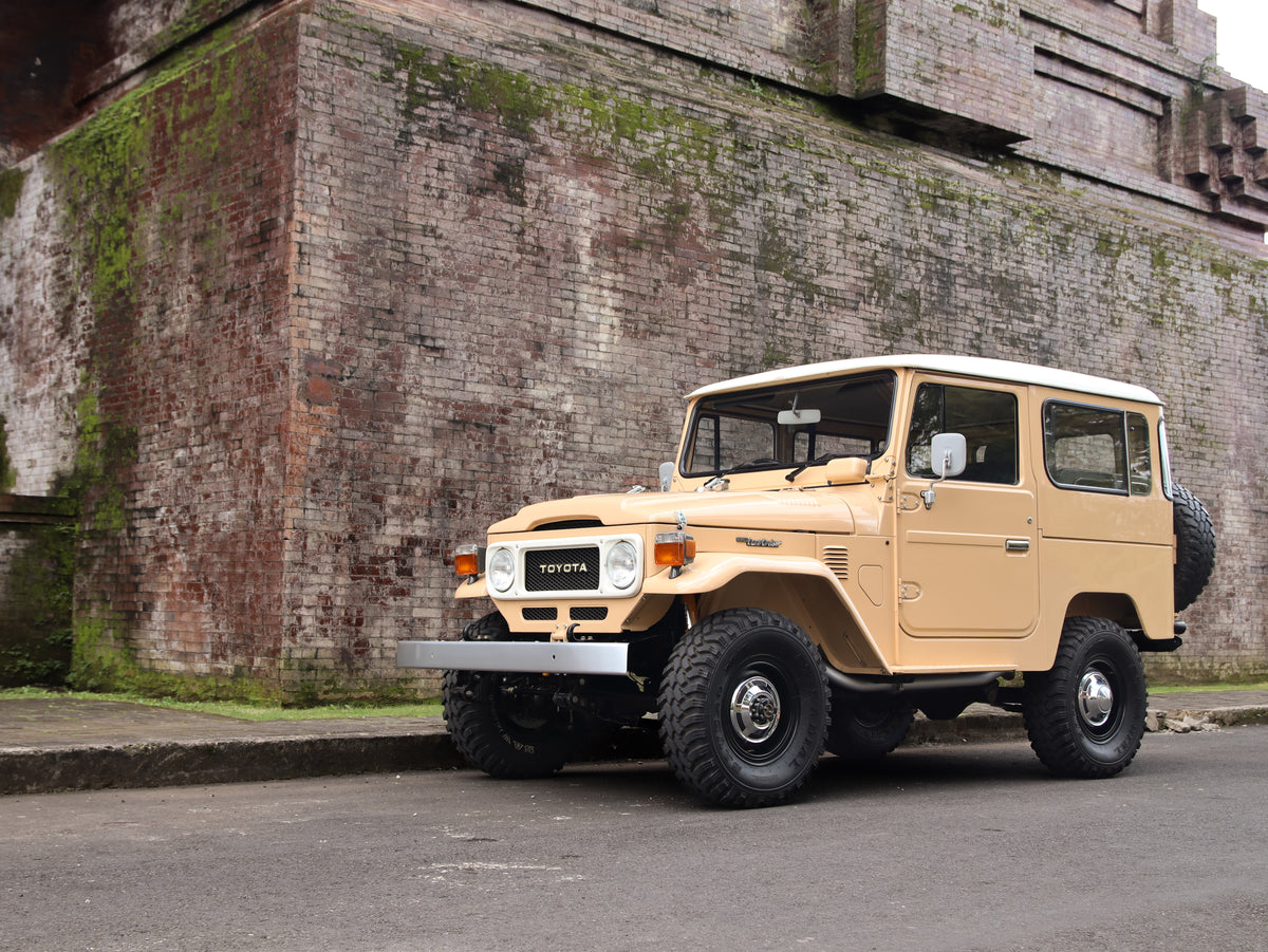 1981 Beige Toyota FJ40 Land Cruiser with 15" Steel Rims GT Radial M/T Tyres and Bulk New Genuine Toyota Parts