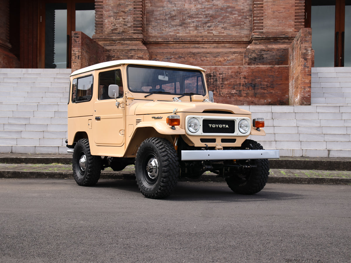 1981 Beige Toyota FJ40 Land Cruiser with 15" Steel Rims GT Radial M/T Tyres and Bulk New Genuine Toyota Parts