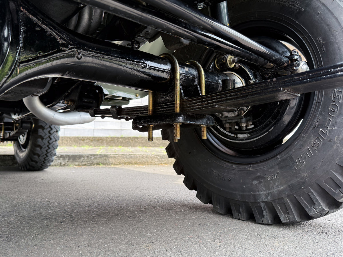 Well-detailed Solid Chassis and New Genuine Toyota Shocks of Grey 1979 Toyota FJ40 Land Cruiser Restored by Hogg & Swan