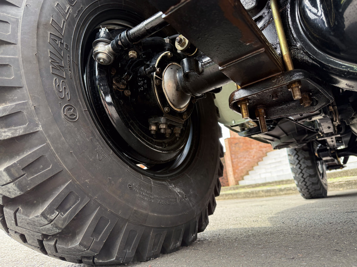 Well-detailed Solid Chassis and New Genuine Toyota Shocks of Grey 1979 Toyota FJ40 Land Cruiser Restored by Hogg & Swan