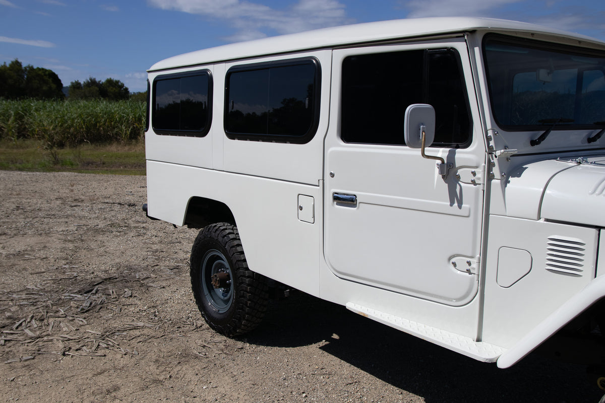 Classic 40 Series White 1982 Toyota FJ45 Troop Carrier Land Cruiser Full Restoration For Sale 