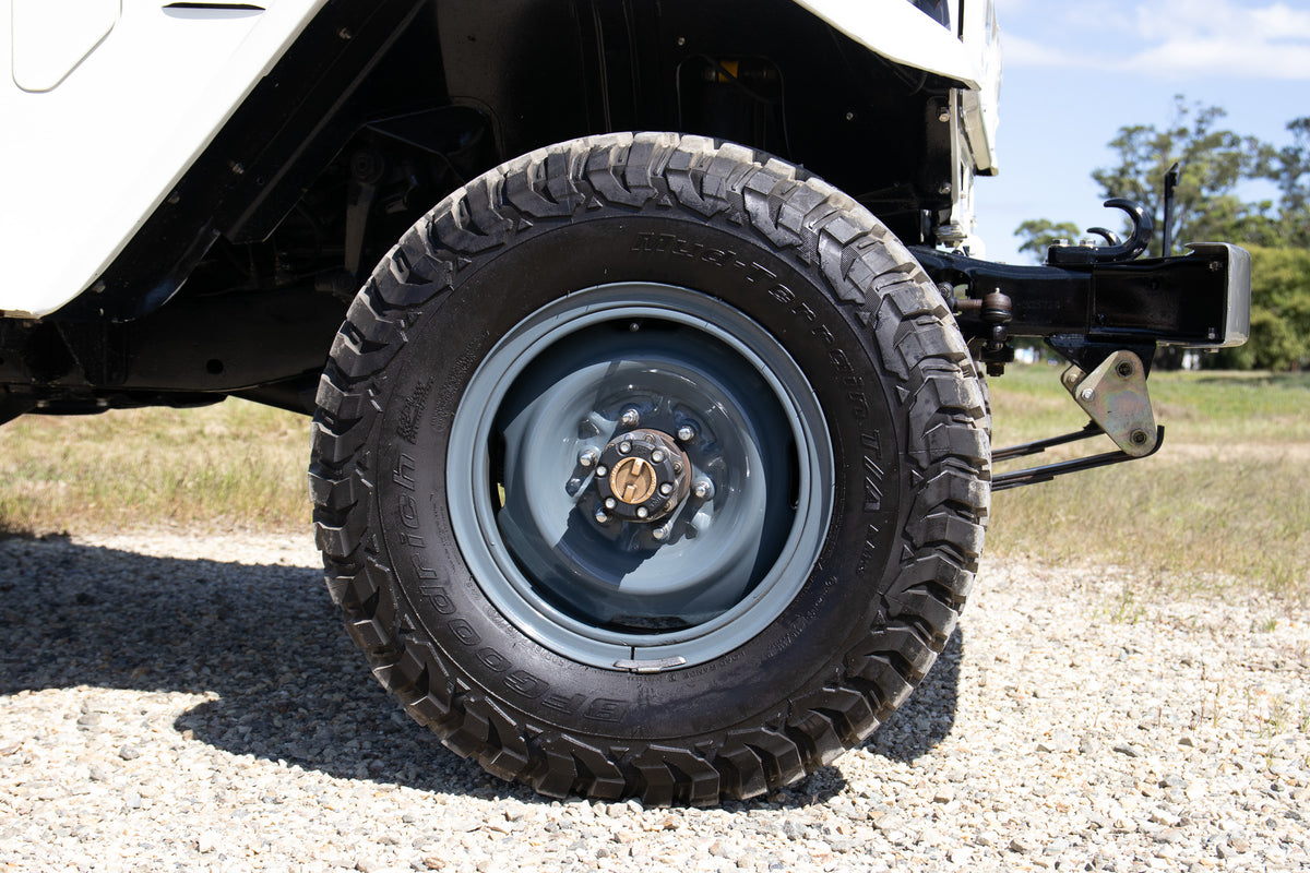 Vintage 40 Series White 1982 Toyota FJ45 Land Cruiser Troop Carrier with Genuine Toyota Parts For Sale